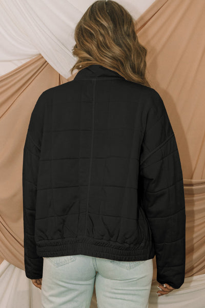 Cozy Women's Black Quilted Winter Jacket with Zip-Up Closure and Pockets for Ultimate Warmth and Style