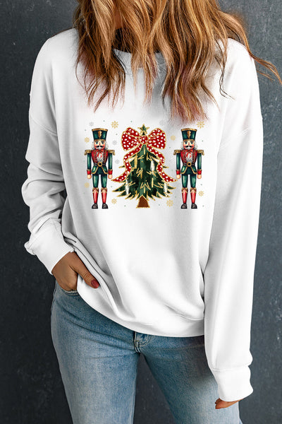 Women's Nutcracker and Christmas Tree Graphic Pullover in Winter White with practical styling and dependable silhouette control.