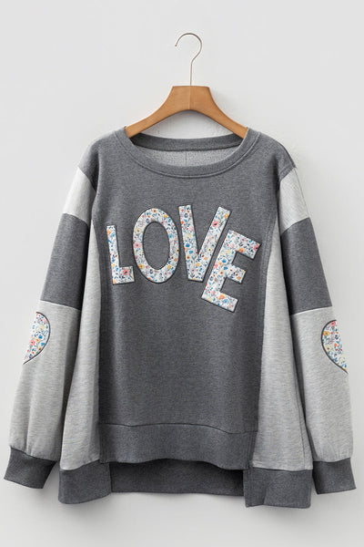 Trendy Women's Dark Grey LOVE Graphic Sweatshirt with Exposed Seams & Stylish Asymmetrical Hem for Effortless Chic Look