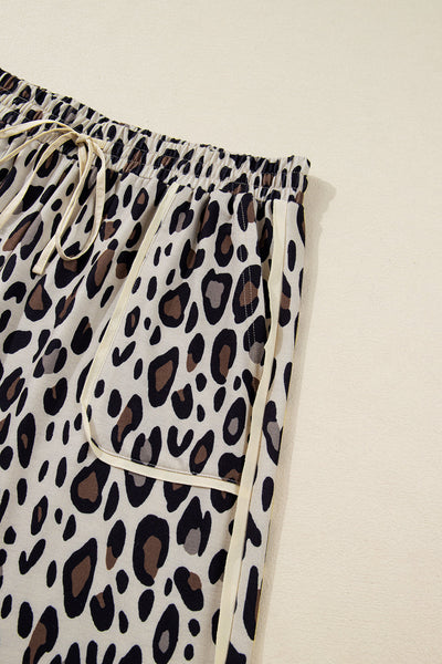 plus size women's khaki leopard print wide leg pants with drawstring pockets and exposed seams for chic comfort made for easy styling and wardrobe