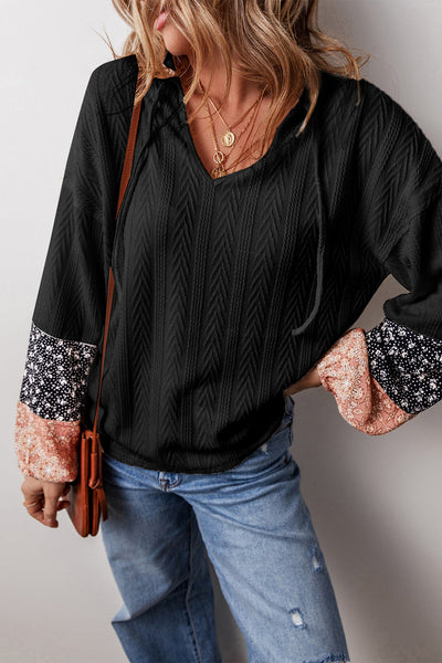 Chic Women's Black Floral Patchwork Knit Blouse - Textured V-Neck with Adjustable Drawstring for a Flattering Silhouette