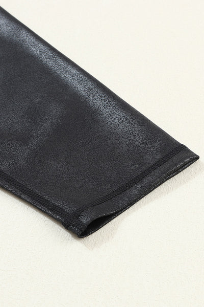 Chic Women's Black Leather Leggings with Crossed Dip Waist for a Stylish and Comfortable Fit