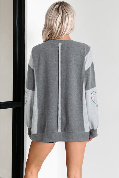 Trendy Women's Dark Grey LOVE Graphic Sweatshirt with Exposed Seams & Stylish Asymmetrical Hem for Effortless Chic Look