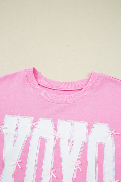 Trendy Women's Pink Bow Sequin XOXO Graphic Sweatshirt - Chic Baggy Fit with Exposed Seams for Casual Style