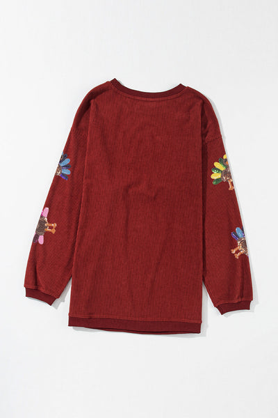 Women's Racing Red Corduroy Turkey Graphic Oversized Sweatshirt made for easy styling and wardrobe coordination, with premium-like structure and
