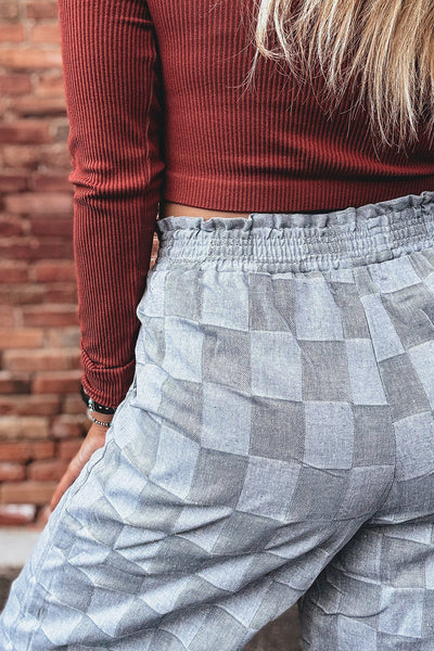 Stylish Women's Sky Blue Loose Denim Pants with Frills, Elastic Waist, and Checkered Design for Comfort and Versatility