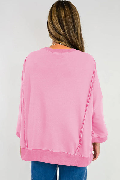 Women's Pink Floral Bow Sweatshirt with Exposed Seams and Slits with practical styling and dependable silhouette control.