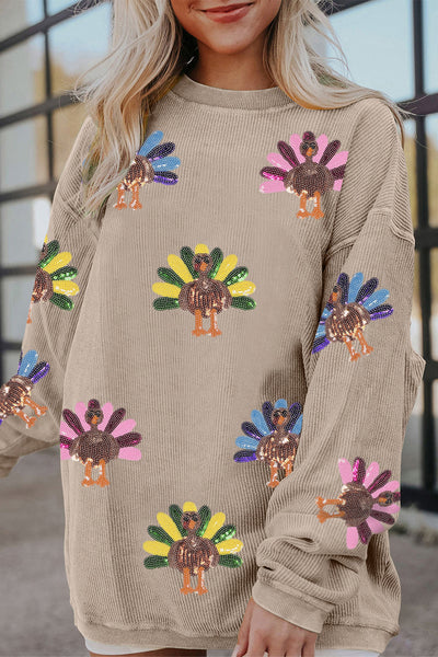 Women's Sequin Turkey Corded Oversized Sweatshirt in Smoke Gray made for easy styling and wardrobe coordination, with premium-like structure and