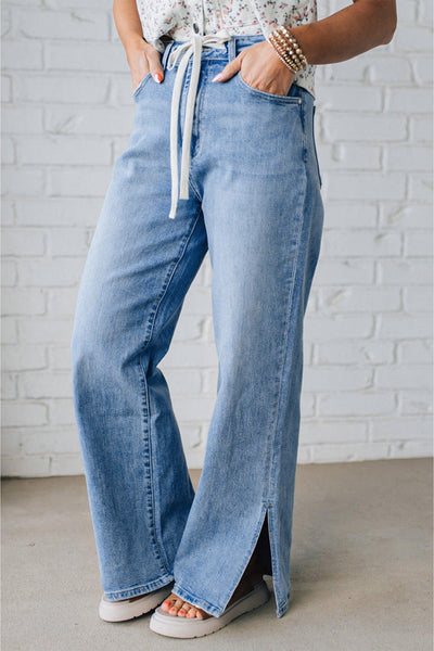 Trendy High-Waisted Women's Distressed Jeans with Slit Legs in Classic Blue for Effortless Everyday Style