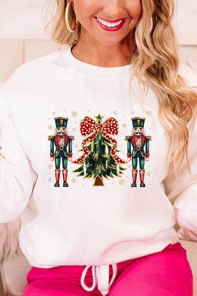 Women's Nutcracker and Christmas Tree Graphic Pullover in Winter White with practical styling and dependable silhouette control.