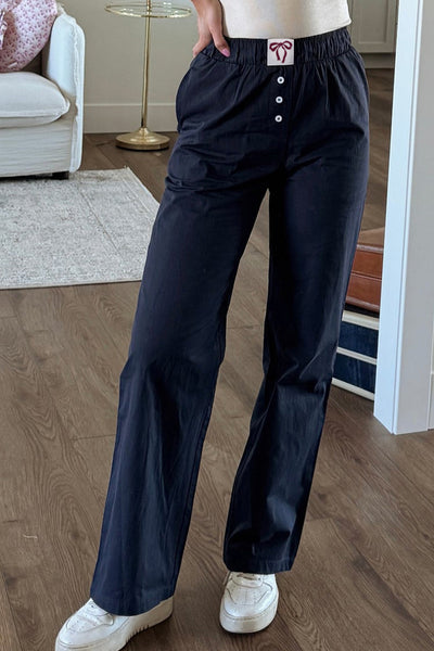 Stylish Women's Black Bow Tie Loose-Fit Pants with Elastic Waist and Button Accents for Ultimate Comfort and Versatility