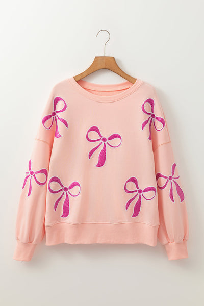 Trendy Oversized Apricot Pink Sweatshirt for Women with Sequined Bowknot - Stylish Comfort for Casual Wear