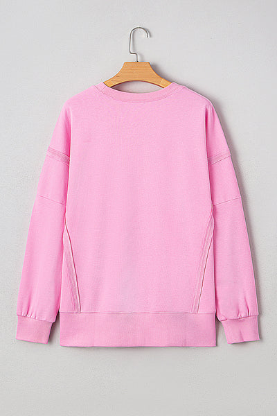 Trendy Women's Pink Bow Sequin XOXO Graphic Sweatshirt - Chic Baggy Fit with Exposed Seams for Casual Style