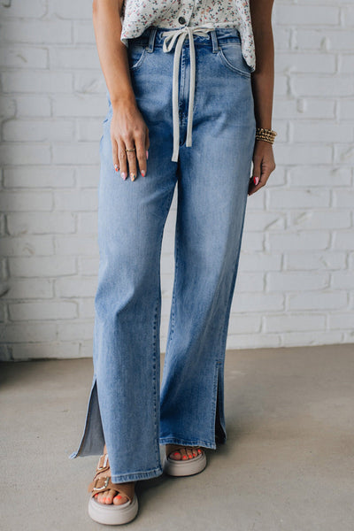 Trendy High-Waisted Women's Distressed Jeans with Slit Legs in Classic Blue for Effortless Everyday Style