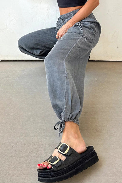 Stylish Medium Grey Denim Joggers for Women with Drawstring, Elastic Waist, Pockets, and Trendy Knot Hem