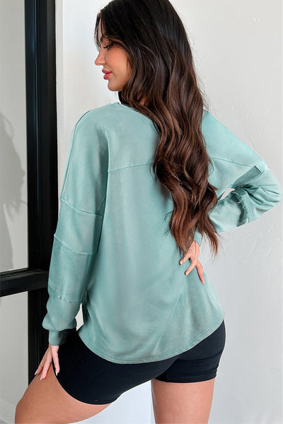Effortless Women's Mist Blue V-Neck Pullover Top with Exposed Seams & Button Detail for Chic Casual Style