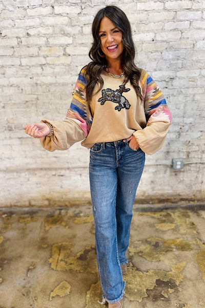 Women's Light Beige Sequin Rodeo Graphic Sweatshirt with Aztec Sleeves made for easy styling and wardrobe coordination, with premium-like structure