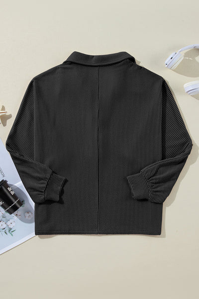 Stylish Women's Black Oversized Ribbed Henley Top with Roll-Up Sleeves and Trendy Twist Detail for Effortless Fashion