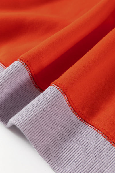 Women‚Äôs Casual Orange Color Block Raglan Sleeve Top with Side Slits - Relaxed Fit for Effortless Style