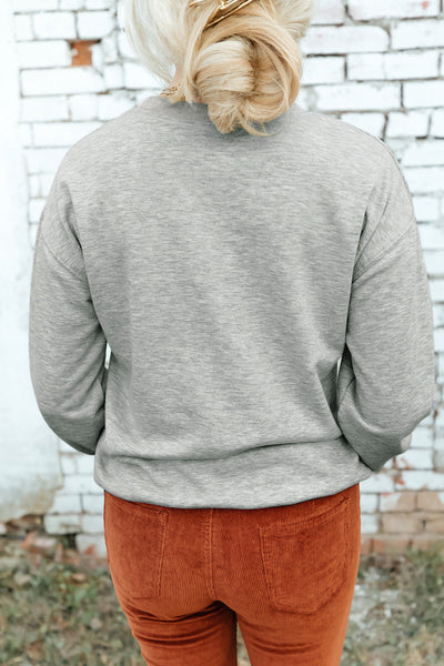 women's mixed-pattern 'merry christmas' gray drop shoulder sweatshirt made for easy styling and wardrobe coordination, with premium-like structure and