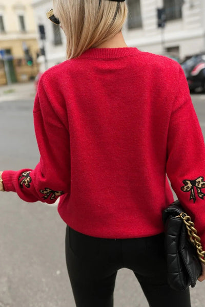 Chic Women's Racing Red Leopard Print Bow Sweater - Cozy Drop Shoulder Design for Effortless Style and Comfort made for easy styling and wardrobe
