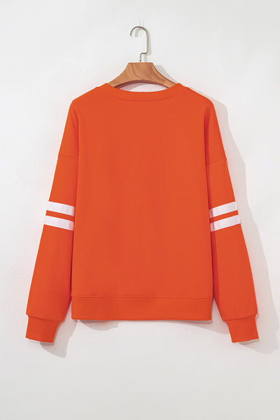 Women's Sequin Turkey Varsity Striped Sweatshirt in Burnt Orange made for easy styling and wardrobe coordination, with premium-like structure and