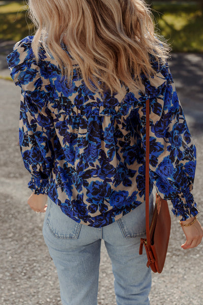 Chic Women's Blue Floral Blouse with Tassel Tie Neck, Ruffle Trim, and Long Puff Sleeves for Effortless Style