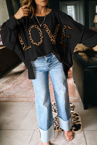 Women's Black Oversized Leopard LOVE Graphic Pullover Sweatshirt made for easy styling and wardrobe coordination, with premium-like structure and
