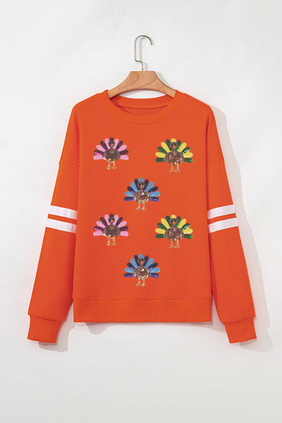 Women's Sequin Turkey Varsity Striped Sweatshirt in Burnt Orange made for easy styling and wardrobe coordination, with premium-like structure and