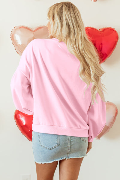 Cozy Light Pink Oversized Pullover Sweatshirt for Women with Embroidered Bow and Trendy Lantern Sleeves