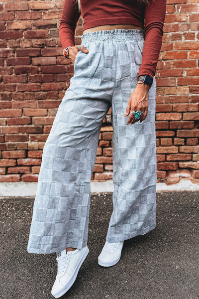 Stylish Women's Sky Blue Loose Denim Pants with Frills, Elastic Waist, and Checkered Design for Comfort and Versatility