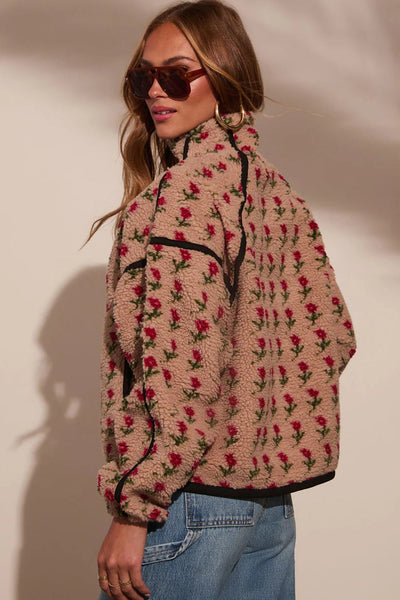 women's rose print sherpa half-zip pullover in beige made for easy styling and wardrobe coordination, with premium-like structure and finish. with