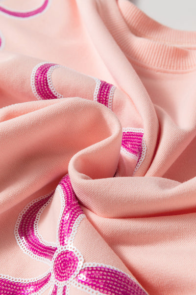 Trendy Oversized Apricot Pink Sweatshirt for Women with Sequined Bowknot - Stylish Comfort for Casual Wear