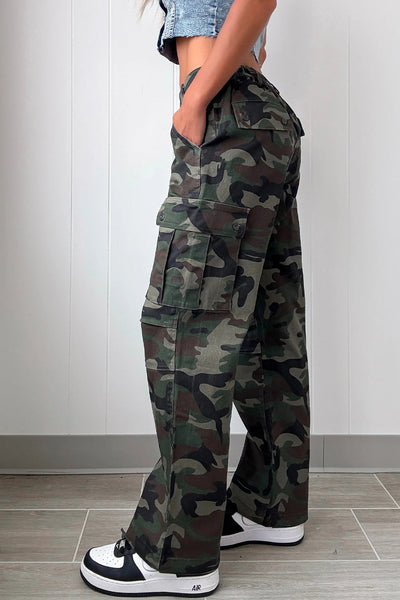 stylish women's green camouflage loose fit pants with button flap pockets and trendy patch accents made for easy styling and wardrobe coordination,