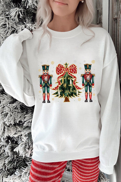 Women's Nutcracker and Christmas Tree Graphic Pullover in Winter White with practical styling and dependable silhouette control.