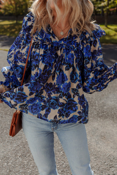 Chic Women's Blue Floral Blouse with Tassel Tie Neck, Ruffle Trim, and Long Puff Sleeves for Effortless Style