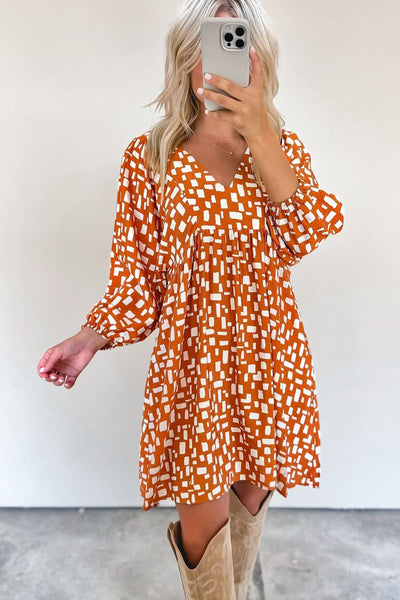 Women's Flowy Orange Geometric Short Dress with Tasseled Lace-Up V-Neck and Empire Waist for Effortless Summer Style