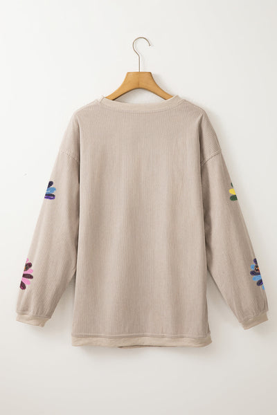 Women's Sequin Turkey Corded Oversized Sweatshirt in Smoke Gray made for easy styling and wardrobe coordination, with premium-like structure and