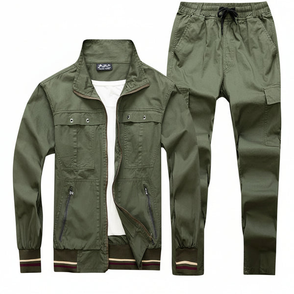 An olive green men's two-piece outfit set consisting of a zip-up utility jacket and matching cargo pants, displayed against a dark gray gradient background.