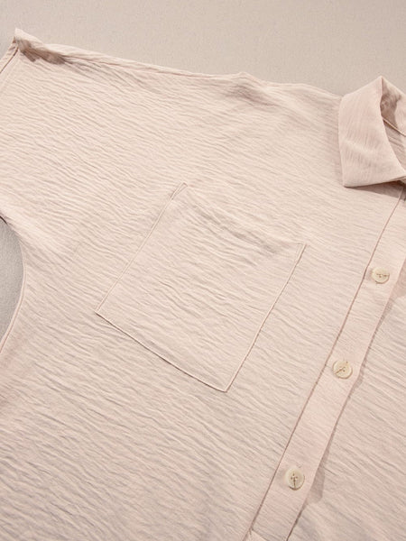 Women's Plus Size Cotton-Blend Relaxed Button-Up with Roll-Tab Sleeves made for easy styling and wardrobe coordination, with premium-like structure