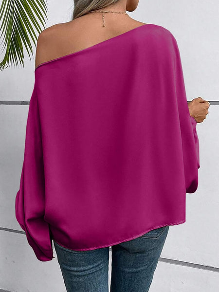 Shimmering Pink Satin Blouse with Unique Neckline and Balloon Sleeves