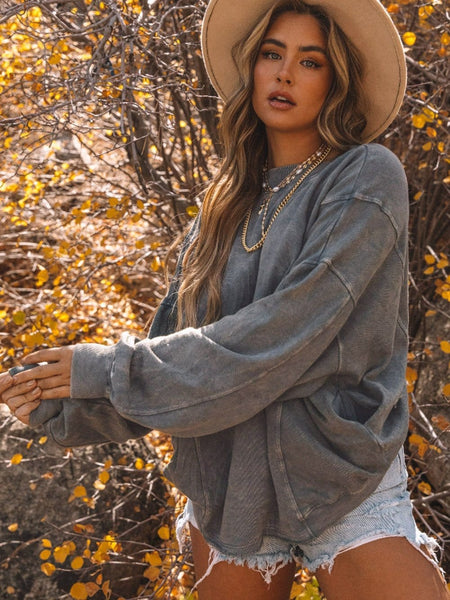 Women's Puff Sleeve Knit Blouse with Ruched Shoulders made for easy styling and wardrobe coordination, with premium-like structure and finish.