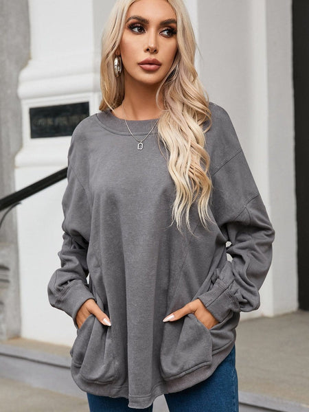 Women's Puff Sleeve Knit Blouse with Ruched Shoulders made for easy styling and wardrobe coordination, with premium-like structure and finish.