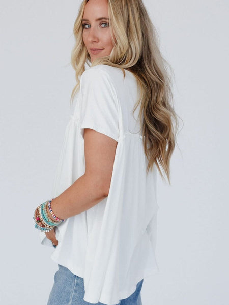 Short Sleeve Dress with Pockets with practical styling and dependable silhouette control.