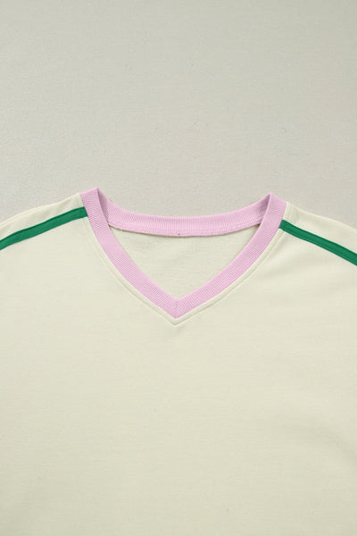 Women's Cream and Emerald Colorblock V-Neck Pullover Skort Set