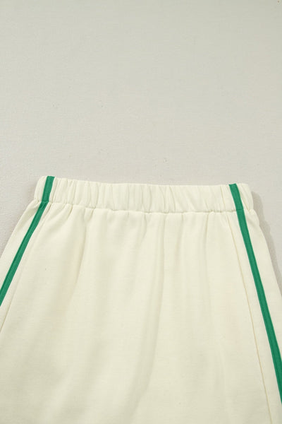 Women's Cream and Emerald Colorblock V-Neck Pullover Skort Set