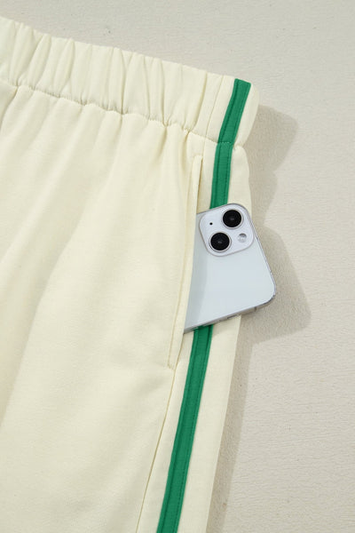Women's Cream and Emerald Colorblock V-Neck Pullover Skort Set