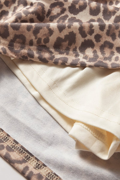 Women's Light French Beige Leopard V-Neck Pullover and Mini Skirt Set with practical styling and dependable silhouette control.