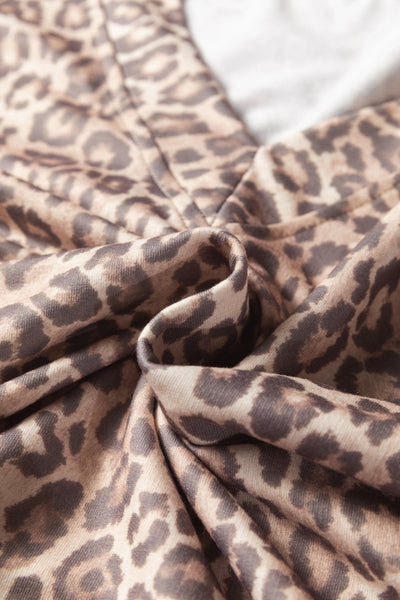 Women's Light French Beige Leopard V-Neck Pullover and Mini Skirt Set with practical styling and dependable silhouette control.