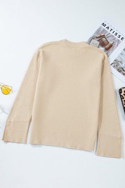 Women's Parchment Waffle Knit Sweater with Split Cuffs and Drop Shoulders with practical styling and dependable silhouette control.
